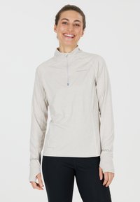 Light gray long-sleeve top with a quarter zip, raglan sleeves, and thumbholes. Features subtle "ENDURANCE" branding. Smooth texture.