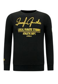 Zwarte katoenen sweat shirt met gele geborduurde tekst. Ronde hals, lange mouwen, geribbelde manchetten en tailleband.