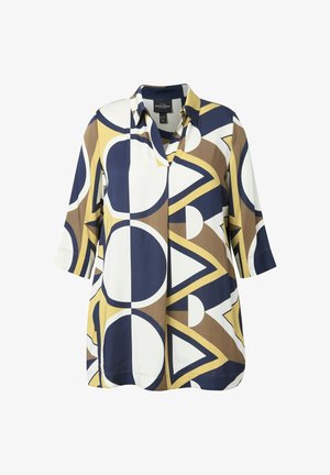 Chemisier avec des manches 3/4, présentant des motifs géométriques en marine, blanc, jaune moutarde et marron.