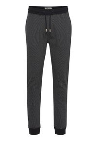 Črne trenirke iz teksturiranega materiala, z vrvico za prilagajanje pasu in črnimi rebrastimi manšetami. Eleganten in moden dizajn z minimalnim vzorcem.