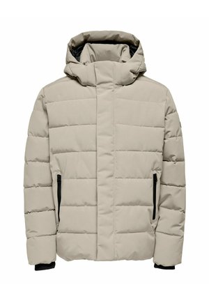 Veste d'hiver matelassée beige avec capuche, fermeture éclair à l'avant recouverte par un rabat et poches latérales zippées noires.