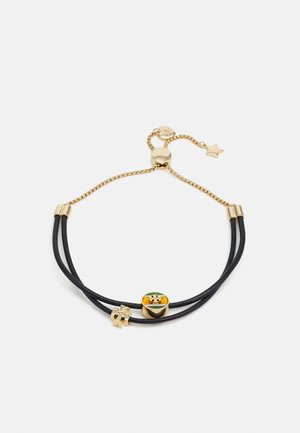 Adjustable black cord bracelet with gold chain, gold puzzle piece charm, and round charm featuring a multicolored puzzle design.