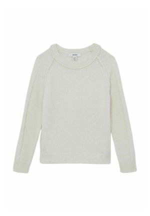 Šviesiai dramblio kaulo spalvos megztinis, pagamintas iš minkštos siūlų, turi apvalų kaklą, raglan tipo rankoves, o kraštai ir apykaklė yra raišteliais, užtikrinantys patogų prigludimą.