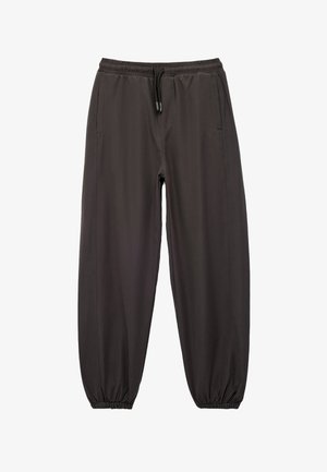 Sorte joggerbukser med elastisk talje og snøre, der har sidelommer og elastiske manchetter ved anklerne. Glat, letvægtsstof.