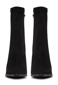 Black suede ankle boots with a smooth texture, a sleek design, and a pointed toe, featuring a side zipper and a minimalistic silhouette.