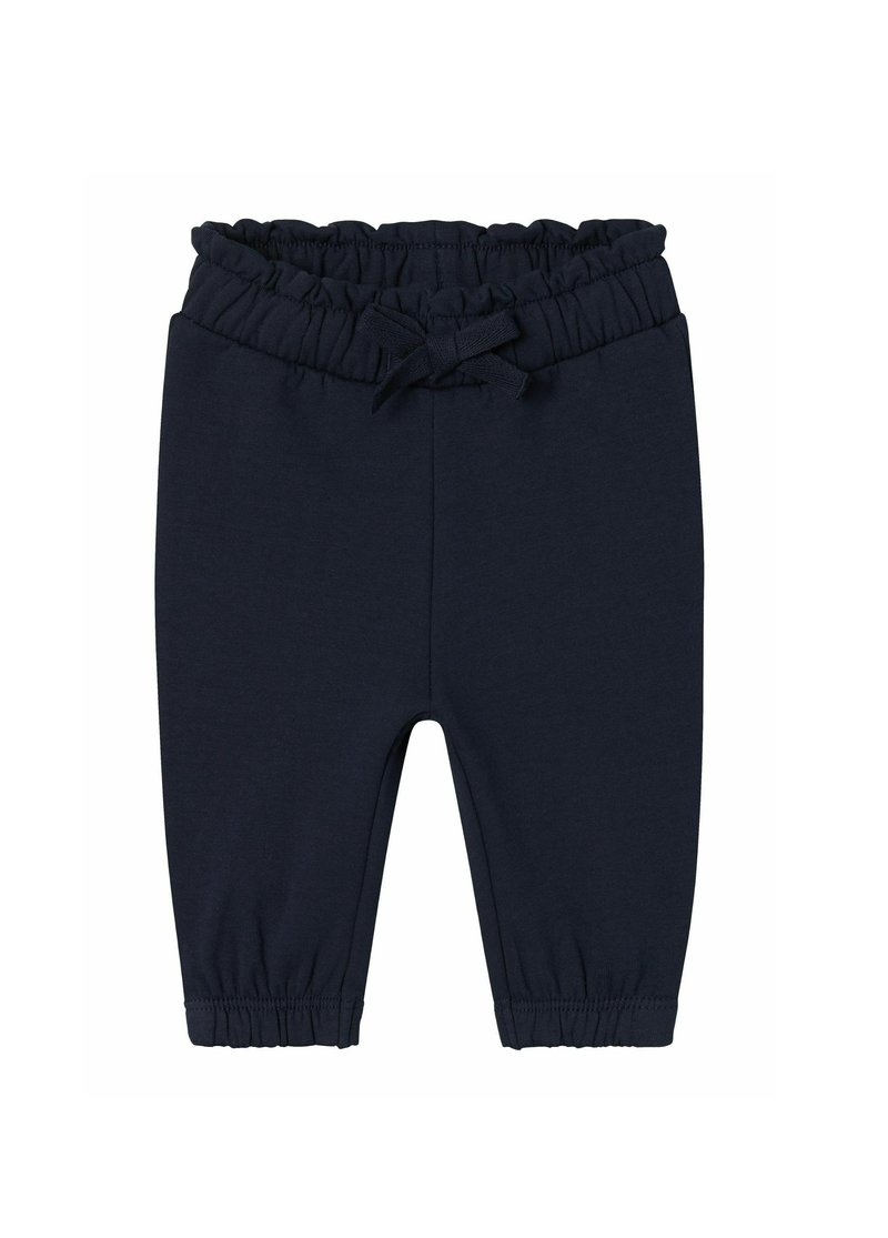 Pantalones de algodón azul marino con una cinturilla elástica fruncida, cordón de ajuste y puños elásticos en los tobillos. Textura suave, diseño casual.