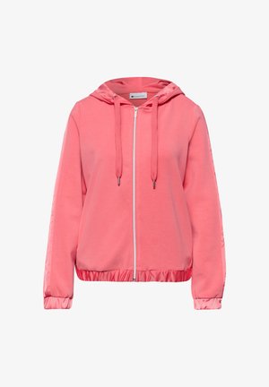 Sweat à capuche zippé rose avec cordons de serrage, poignets et ourlet élastiques, présentant une bordure en tissu lisse et brillant sur les manches et le bas.