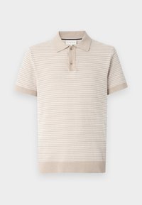 Kortermet polo-shirt i lys beige med strukturerte striper, krage og placket med tre knapper. Mykt stoff med ribbestrikkede mansjetter.