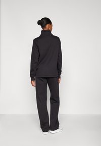 Champion ICONS TONAL LOGO SET - Treniņtērps - black