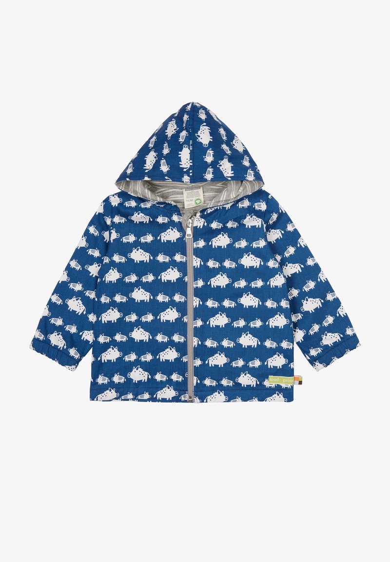 Blå huva jacka med vita djurmönster, framsidans dragkedja, elastiska ärmslut och randig innerfoder. Har en liten etikett vid nertill.