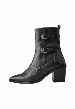 Botines camperos - black