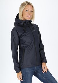 Navy waterproof jacket with a hood, featuring a full zip, adjustable drawstring, and two side pockets. Smooth, lightweight material.
