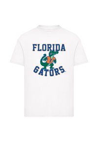 White cotton t-shirt featuring "FLORIDA GATORS" in bold orange and navy blue text, with a green alligator graphic. Short sleeves, crew neck.