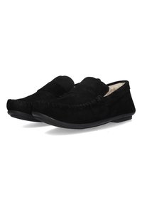 Scarpe slip-on in suede nero con un interno morbido, caratterizzate da dettagli cuciti e una suola in gomma flessibile per comfort e supporto.