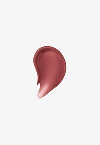 Swatch di rossetto cremoso in una tonalità di rosa tenue con una texture liscia e una leggera lucentezza, presentato in una forma curva e organica.