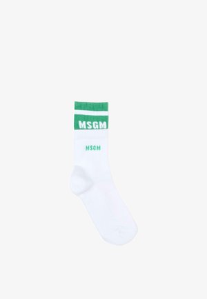 Witte sok met een groene geribbelde boord en twee MSGM-logo's in het groen, één grote dichtbij de boord en één kleinere eronder.