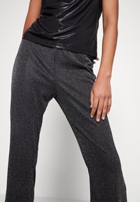 Monki Tygbyxor - black