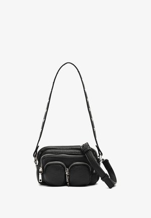 Black leather crossbody bag with three zippered compartments, a flat design, and a strap featuring circular hardware accents.