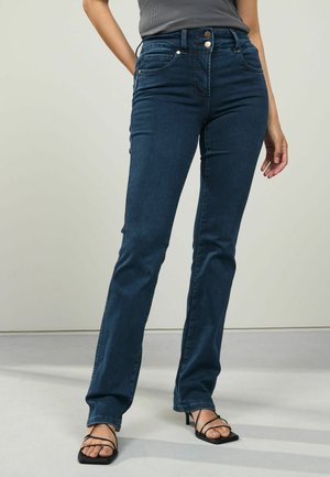 Mörkblå högmidjade jeans med slim fit, fem fickor och knappstängning. Materialet har en mjuk, denimtextur med lätt stretch.