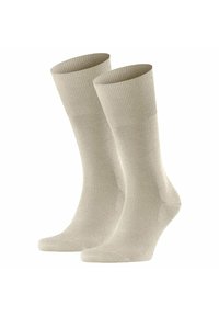 Beige Baumwollsocken mit geripptem Bündchen, nahtloser Spitze und glatter Textur; entworfen für Komfort und Langlebigkeit.