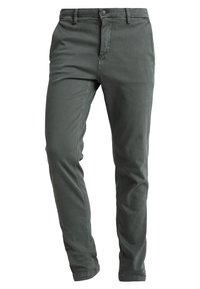 Tmavě šedé bavlněné kalhoty s úzkým střihem, s předními kapsami, zipem a klasickým zapínáním na knoflík. Měkká textura, minimalistický design.