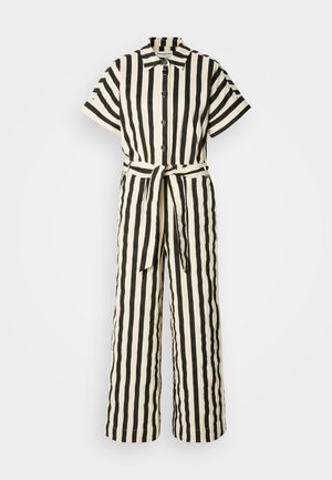 Ριγέ ολόσωμη φόρμα σε μαύρο και κρέμ. Κοντά μανίκια, κλείσιμο με κουμπιά μπροστά και ζώνη στη μέση. Φαρδιά πόδια με λεία υφή.