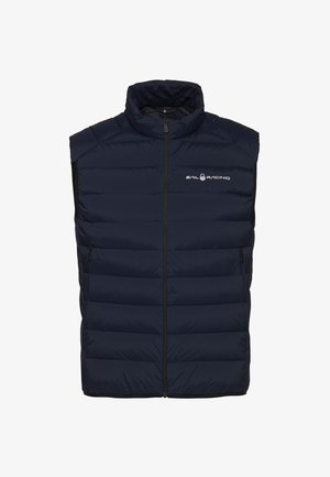 Marineblaue Steppweste mit hohem Kragen, Reißverschluss vorne und gesteppten Paneelen. Verfügt über ein Logo auf der Brust und seitliche Taschen zur Aufbewahrung.