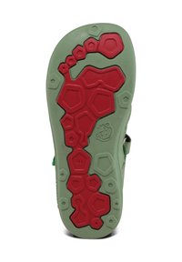 Suola di scarpa in gomma verde con un motivo testurizzato e accenti esagonali rossi, con una marcatura di taglia 28.