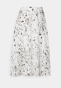 White skirt featuring a splatter pattern in black and beige, knee-length, with a smooth texture and a flared silhouette.
