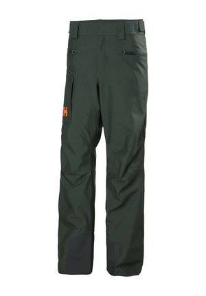 Pantalones exteriores de color verde oscuro con múltiples bolsillos, refuerzos negros en las rodillas y letras naranjas en un bolsillo lateral.