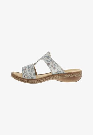 Dame slip-on sandal med lyseblomstrede remme, polstret beige fodseng og tekstureret lav kileformet sål.
