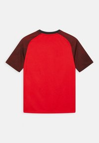JAKO T-Shirt sport - rot/schwarz