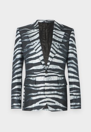 Schwarzer Blazer mit einem Zebra-Streifenmuster in Weiß und Grau, Ein-Knopf-Verschluss, zwei vorderen Taschen und einem Kontrastfutter.