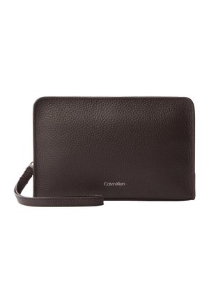 Calvin Klein FOIL EMBOSS SMALL - Toilettas - dark brown
