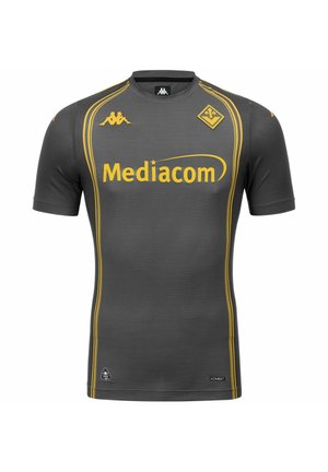 Maillot de football gris foncé avec des rayures jaunes, logo Mediacom, logo de la marque Kappa et un emblème d'équipe jaune en forme de diamant sur la poitrine.