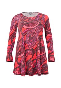 Tunique à manches longues avec un ourlet évasé, présentant un motif paisley rouge et rose vif et un col rond.