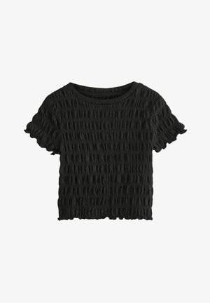 Svart kortärmad topp i ett texturerat, skrynkligt tyg. Har en rund halsringning och volangkanter på ärmarna, vilket ger en avslappnad stil.