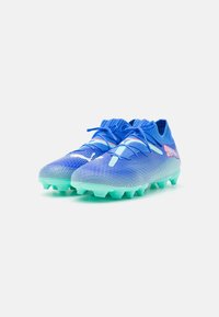 Puma FUTURE 7 PRO FG/AG JR UNISEX - Kopačky na pevný povrch - bluemazing/white/electric peppermint