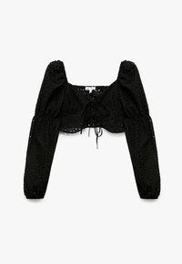 Blusa corta negra con mangas largas abullonadas, escote cuadrado y frontal con cordones. Hecha de tela de ojales con agujeros recortados. Textura suave.
