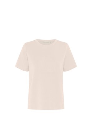 T-shirt a maniche corte in cotone leggero color beige chiaro con un design del logo testurizzato sul davanti e scollatura rotonda. Vestibilità fluida e casual.