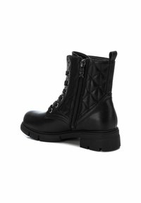 XTI Bottines à lacets - black