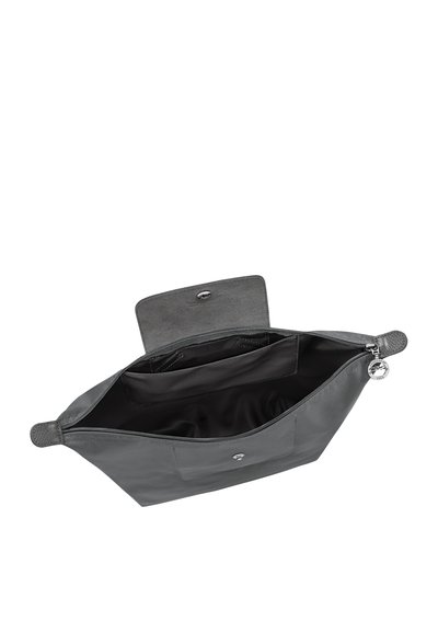 Gray leather handbag with open top flap showing black interior lining and zippered pocket with silver round zipper pull.
