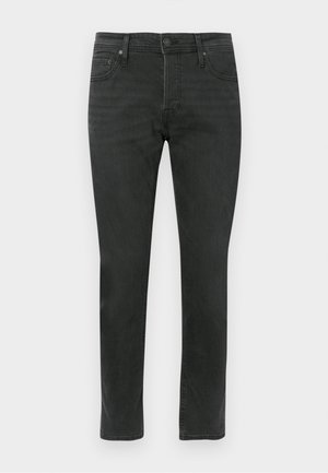 Tamsiai pilki džinsai su siauru dizainu, penkių kišenių stiliumi ir mygtuko uždarymu. Lygus paviršius su subtiliu išblukimu.