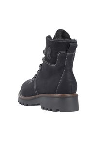 Black leather ankle boot with a textured surface, lace-up front, contrasting white stitching, and a thick rubber sole for traction.