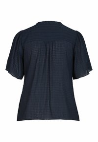 Blouse bleu marine à manches courtes en tissu texturé, coupe ample et empiècement dos froncé.