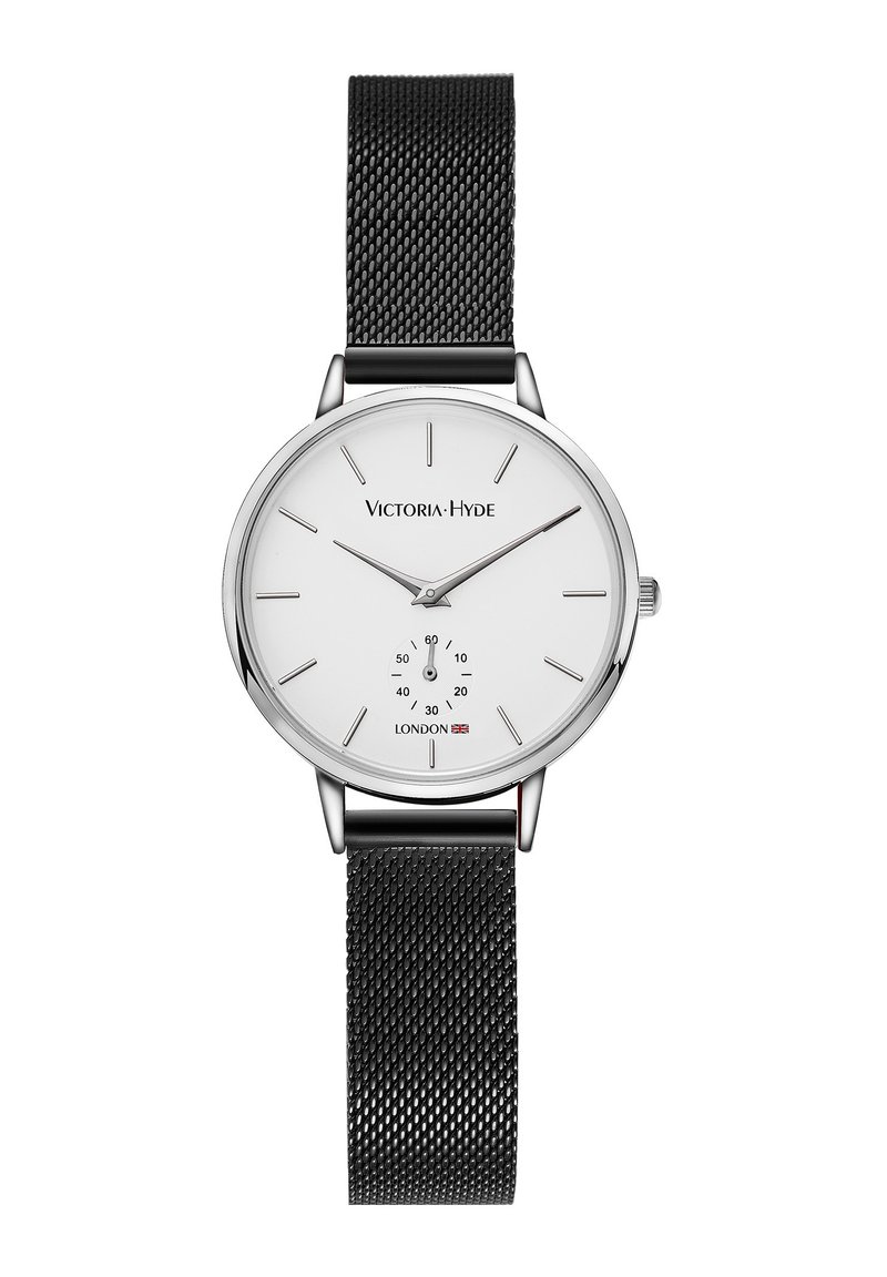 Orologio rotondo in argento con quadrante bianco, cinturino in rete nera, indici minimalisti e sottocronografo per i secondi. Nome del marchio mostrato nella parte superiore.