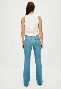 Next STRETCH FLARE TALL - Džíny Bootcut - mid blue