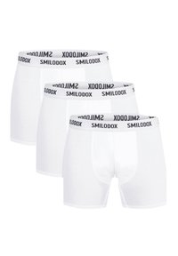 White boxer briefs in a pack of three with a black elastic waistband featuring 'SMILODOX' logo. Soft, smooth fabric with a fitted design.