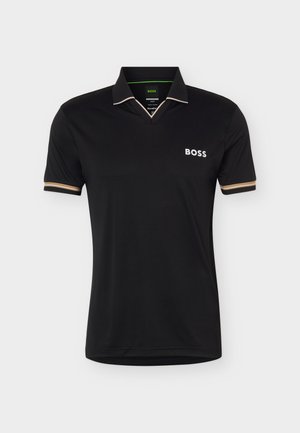 Polo noir à manches courtes avec bordures beige et blanche sur le col et les manches, avec le logo « BOSS » sur la poitrine gauche.