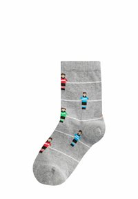 Calzini grigi con un motivo giocoso di piccole figure in abiti rossi, verdi e blu, con strisce bianche orizzontali che attraversano il design.